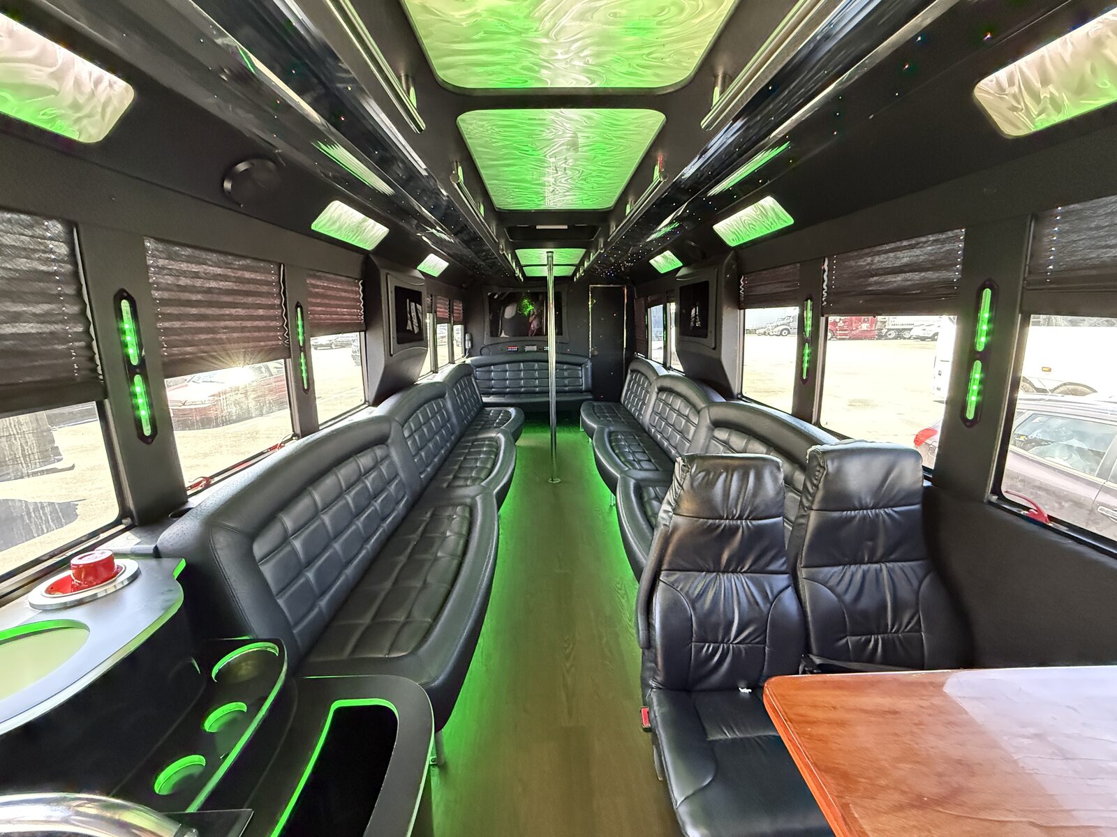 Luxury leather party bus interior with color-changing LED lighting