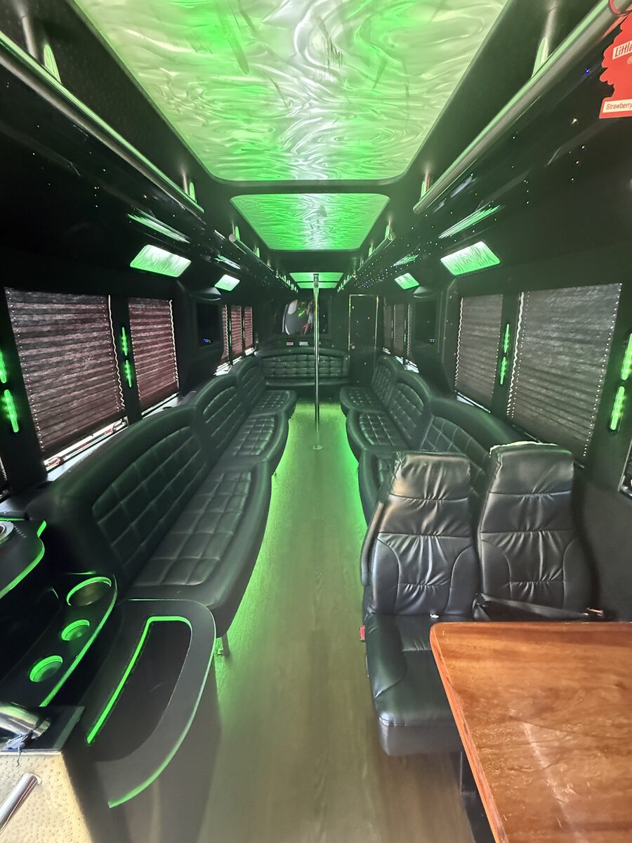 Glam party bus interior with diamond-stitch panels and LED lighting